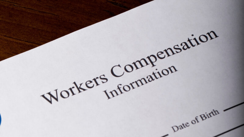 Workers’ compensation information form on a desk